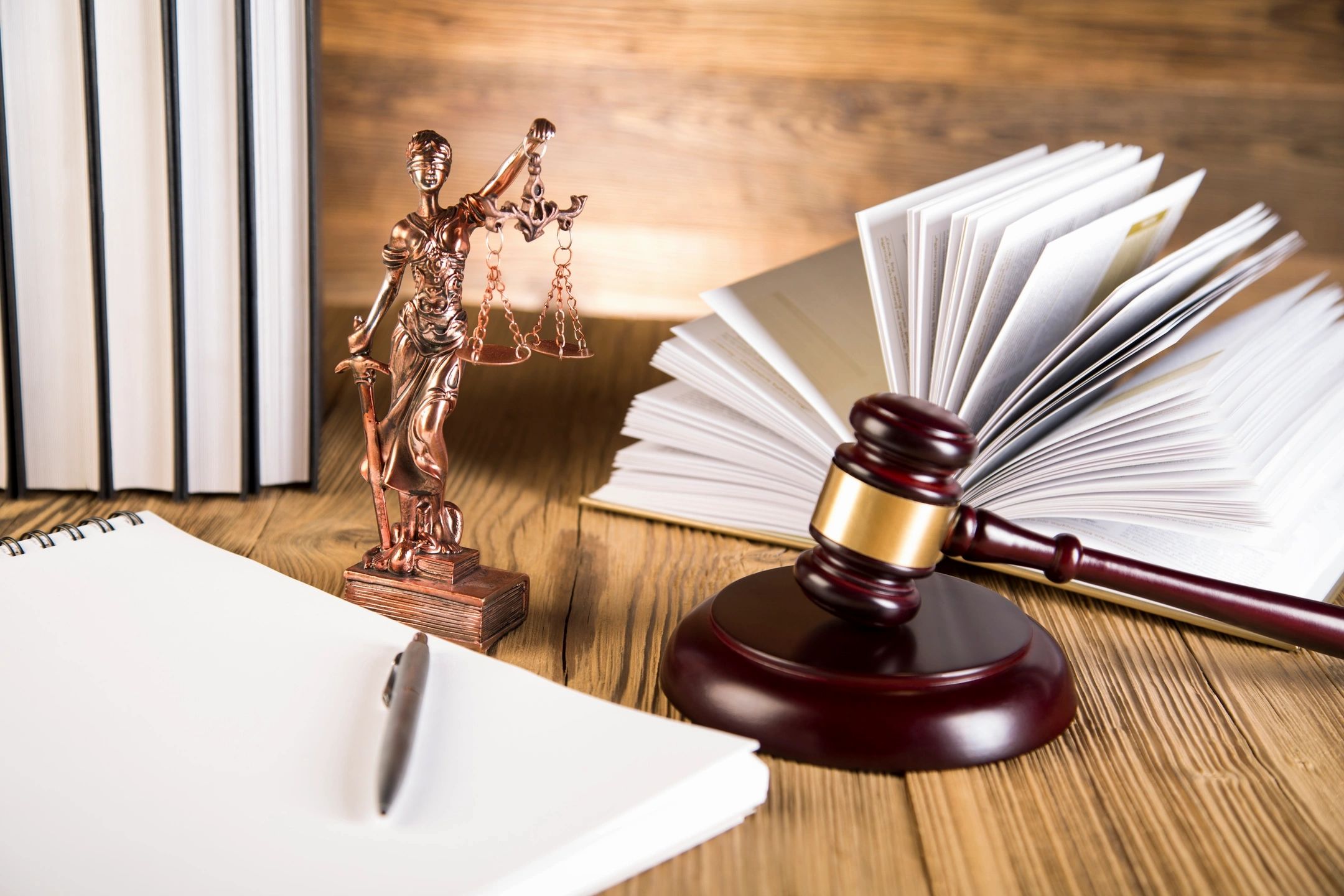Law office desk with gavel and books